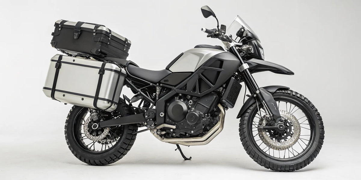 Adventure motorcycle with hard pannier luggage for touring.